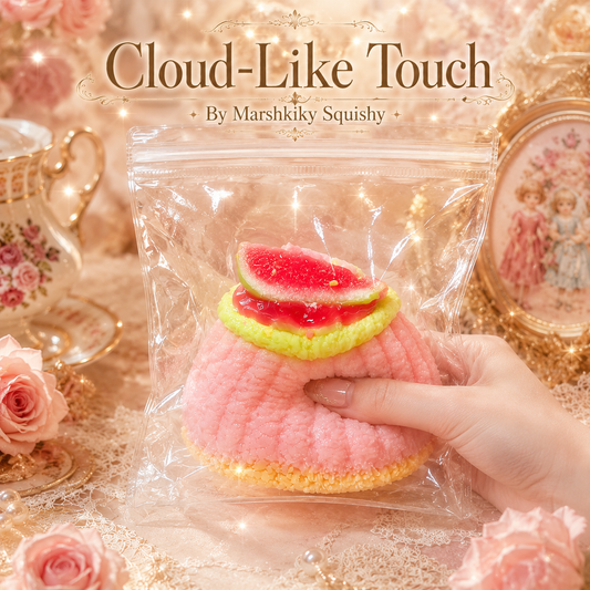 Hand squeezing a soft pink cake squishy toy demonstrating its cloud-like touch and slow rebound texture.