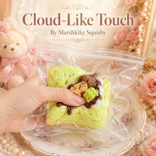 Hand squeezing a soft Marshkiky green squishy toy showing cloud-like touch.