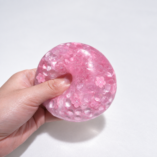 Pink translucent sensory squishy ball with resin sakura blossom details and beads; Sakura Dream handmade sensory squishy ball, product photo 2