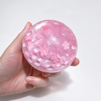 Pink translucent sensory squishy ball with resin sakura blossom details and beads; Sakura Dream handmade sensory squishy ball, product photo 3