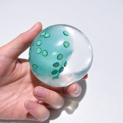 Translucent sensory squishy ball with small resin lemon slice details; Summer Fruit Party handmade sensory squishy ball, product photo 4