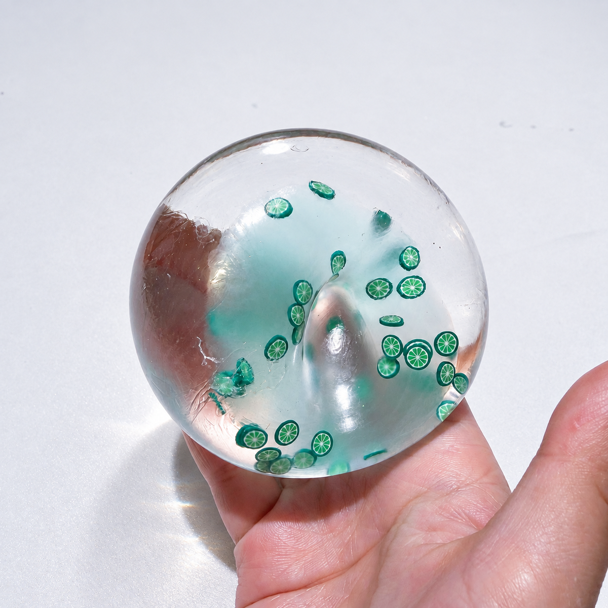 Translucent sensory squishy ball with small resin lemon slice details; Summer Fruit Party handmade sensory squishy ball, product photo 7
