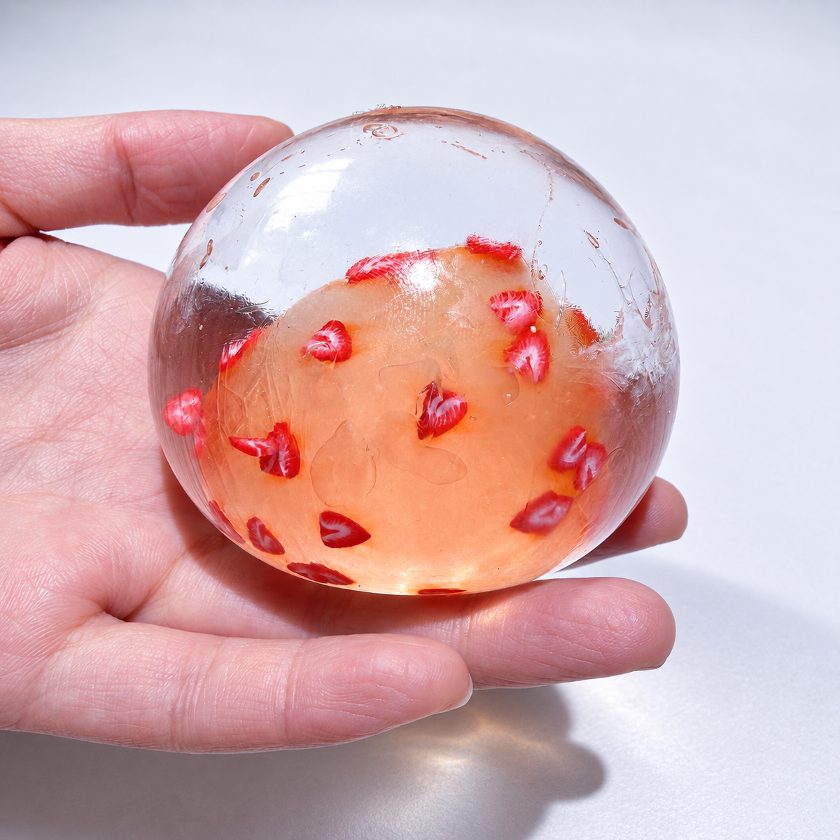 Translucent sensory squishy ball with small resin lemon slice details; Summer Fruit Party handmade sensory squishy ball, product photo 9