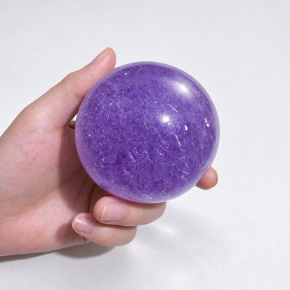 Purple ball with fine transparent decorative strips visible inside